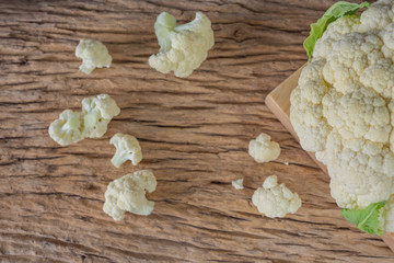 Cauliflower on the wooden floor.