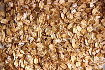 lots of gluten-free oatmeal. concept of gluten free. oatmeal or oat flakes as background.