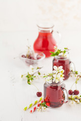 Fresh Cherry juice  in a bottle