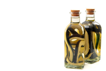 Snakeoil salesman, cure all scam and quack medicine concept theme with bottles of oil and a snake...
