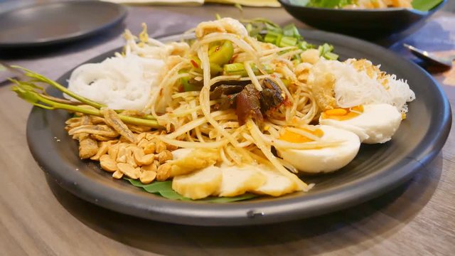 Papaya salad or somtum. Traditional food of Thailand
