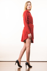 Woman wearing elegant casual red dress