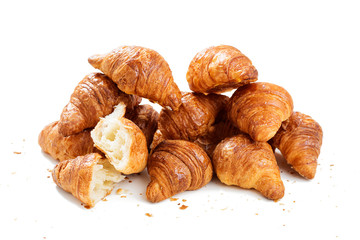 Freshly baked croissants  isolated on white background .