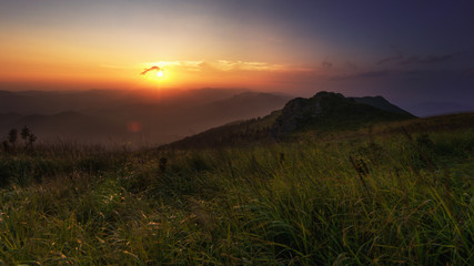 The natural background of the secret light of the evening sky on the panoramic viewpoint, can see the surrounding atmosphere (trees, mountains, clouds) 
