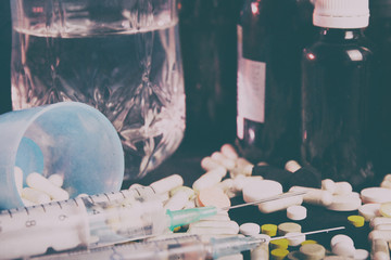 Pills close up on black background