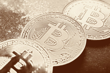 Gold bitcoin on black background