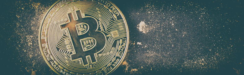 Gold bitcoin on black background