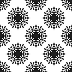 Seamless pattern with abstract flowers. Fashion textile print. Asian fabric background. Vector monochrome design. Perforation floral holes.