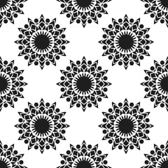 Seamless pattern with abstract flowers. Fashion textile print. Asian fabric background. Vector monochrome design. Perforation floral holes.