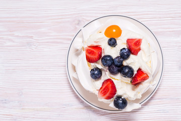 White cake, Meringue with fruits and berries