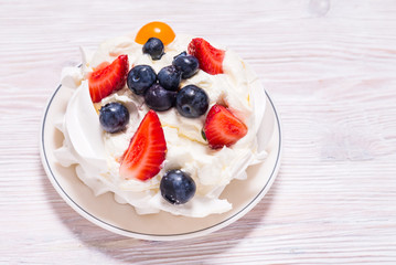 White cake, Meringue with fruits and berries