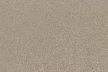 smooth surface of wet sand for background and texture
