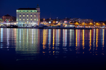 Fototapeta na wymiar Travel by Croatia. Beautiful landscape with Split Old Town on sea shore at night.