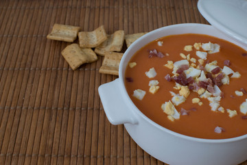typical salmorejo, Spanish Summer tomato soup with boiled eggs and jamon toppings