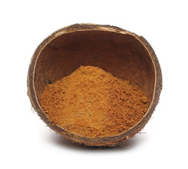 Coconut palm sugar with fruit shell isolated on white background 