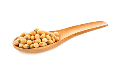 Soybean seeds In wooden spoon on white background
