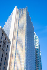 Fototapeta na wymiar Low Angle of Modern Glass Skyscraper