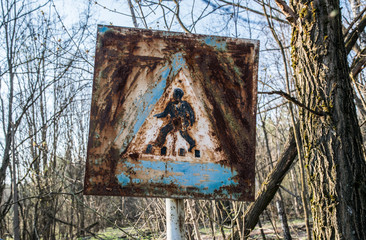 Old road sign in the exclusion zone of the Chernobyl nuclear disaster