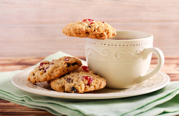 Oaty cherry cookies on plate