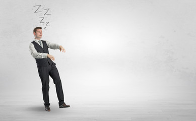 Obraz premium Tired businessman with sleeping sickness going somewhere 