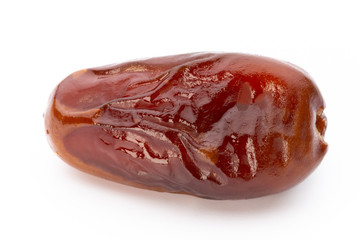 Dry dates isolated on white background. Top view. Flat lay pattern.