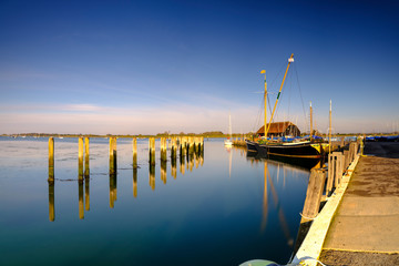 Sunrise over Bosham harbour and village, West Sussex, UK