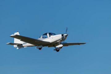 Single-engine sports plane.