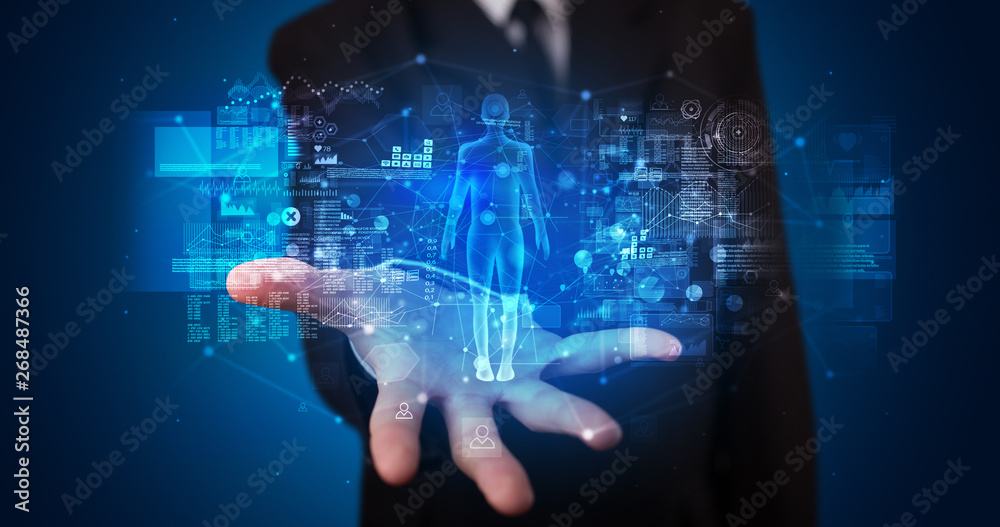 Poster Young person holding hologram projection displaying health related graphs and symbols
