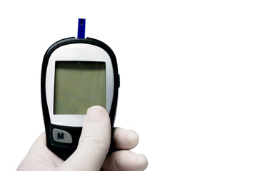 Hand of doctor in white medical glove holding glucose meter with sheet check isolate on white background and make with paths.