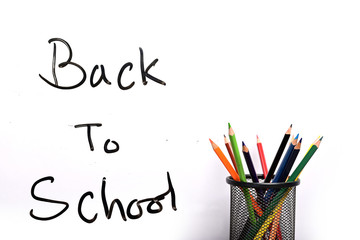 Back to school text with pencil container isolated on white background