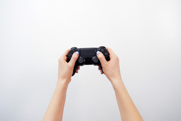 Gamepad in hand. Video games. Gamer. Game contest © AliceCam
