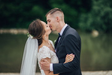 Happy romantic young couple celebrating their marriage. 