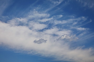Naklejka na ściany i meble Blue sky with white cloud closeup background and texture