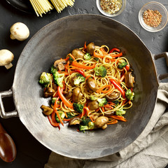 Stir-fry noodles with vegetables in wok