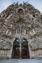 BARCELONA, SPAIN - APRIL 15, 2019: Sagrada Familia basilica in Barcelona. The Antoni Gaudi masterpiece has become a UNESCO World Heritage Site in 1984