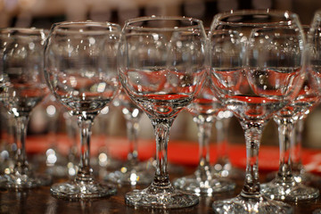 Empty wine glasses on the bar