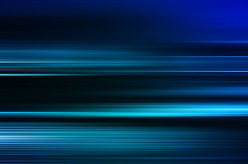digitally generated image of blue light and stripes moving fast over black background