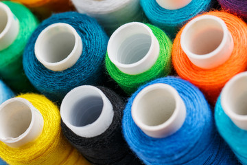 Colorful spools of sewing thread. Colored thread for sewing