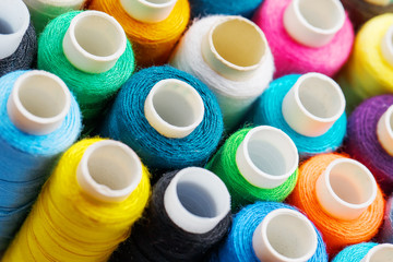 Colorful spools of sewing thread. Colored thread for sewing