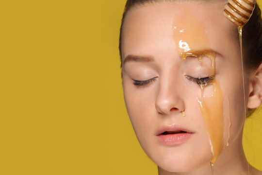 Woman with honey on her face.