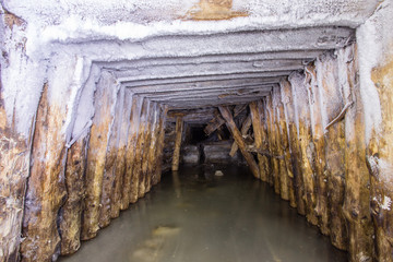 Fototapeta na wymiar Underground mineshaft gold iron ore tunnel