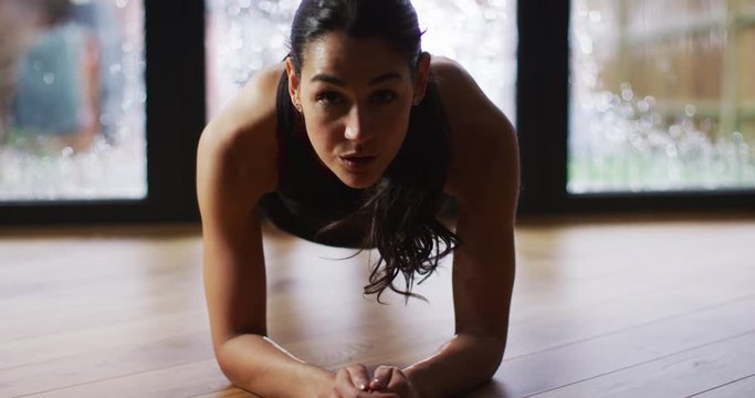 4K Fit athletic woman training at the gym