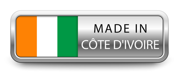 MADE IN COTE D'IVOIRE metallic badge with national flag isolated on white background