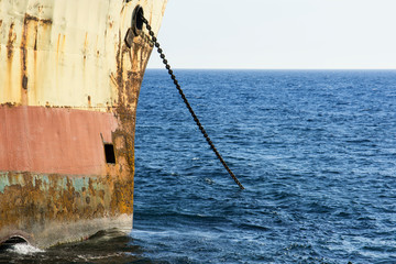 Stranded ship at sunset