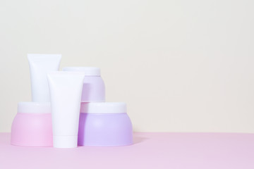 A set tubes of creams. Pastel shades. - 268505138