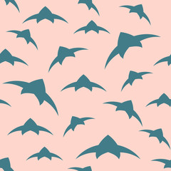 A flock of birds in the sky. Seamless pattern. Vector background
