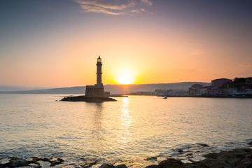 Lighthouse in the port of Chania at sunrise on Crete, Greece