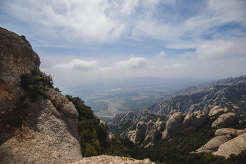 Fototapeta na wymiar Aerial view of Montserrat mountains in a beautiful summer day, Catalonia, Spain 