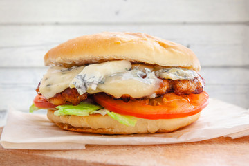 fresh flavored burger with juicy cutlet and blue cheese