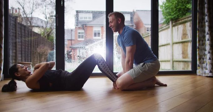 4K Happy smiling couple working out together in partnership. Slow motion.